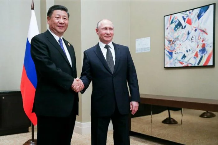 Переговоры глав РФ и КНР в Астане начались с шутки Путина