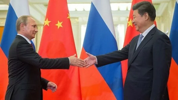 Путин и Си Цзиньпин договорились встретиться на саммите АТЭС